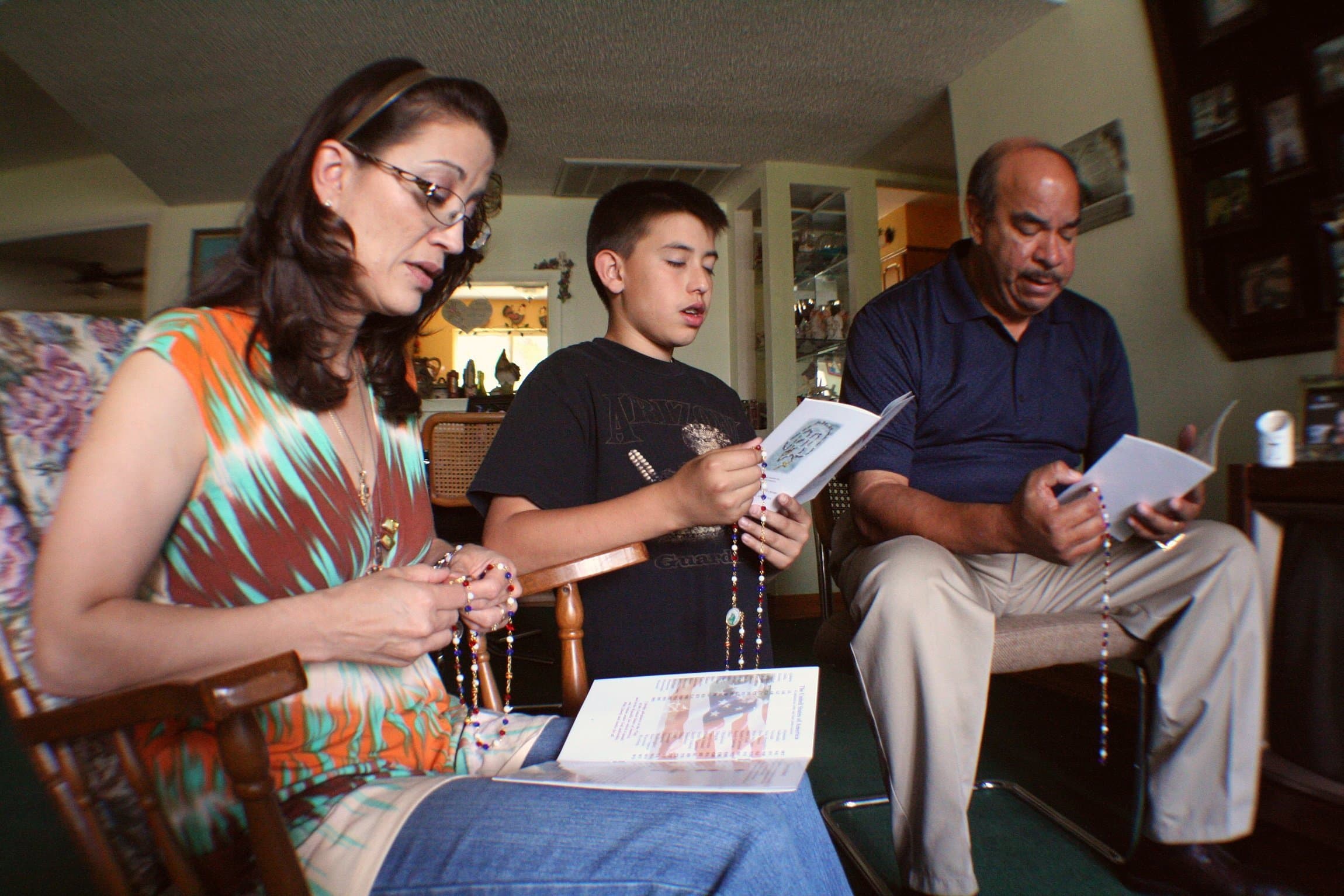 FAMILY PRAYING Fr. Stephen Van Lal Than